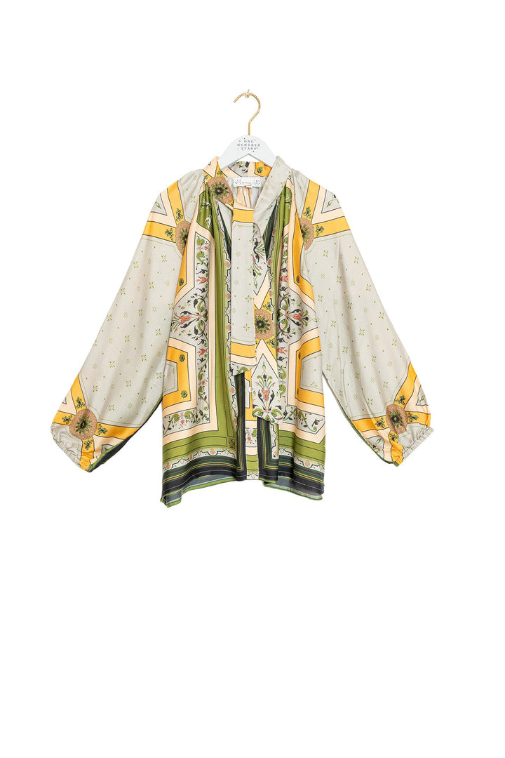 Blouse Fleur De Lys dorée à nœud lavallière