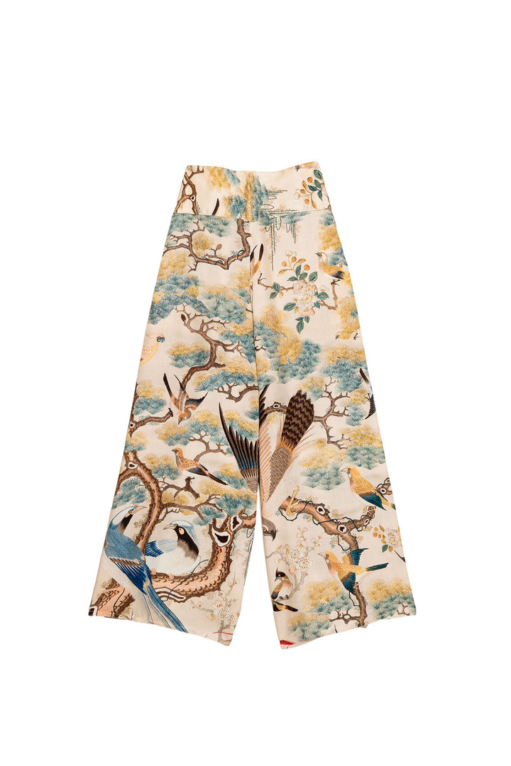 Pantalon palazzo nude à motif colibri