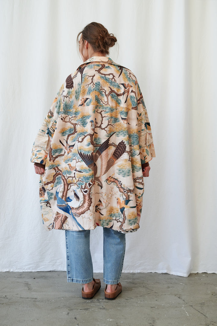 Manteau artisanal nu colibri