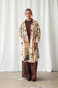 Manteau artisanal nu colibri