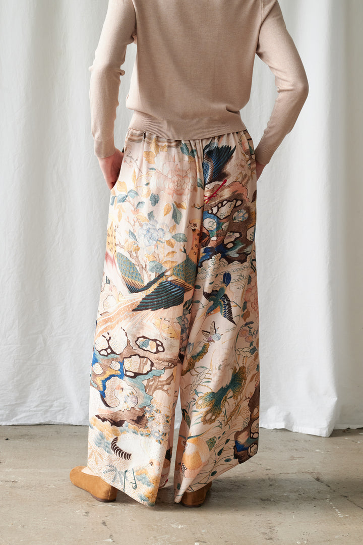 Pantalon palazzo nude à motif colibri