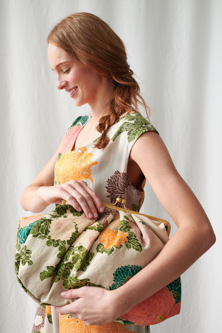 Jacqaurd Putty Kiss Lock Bag