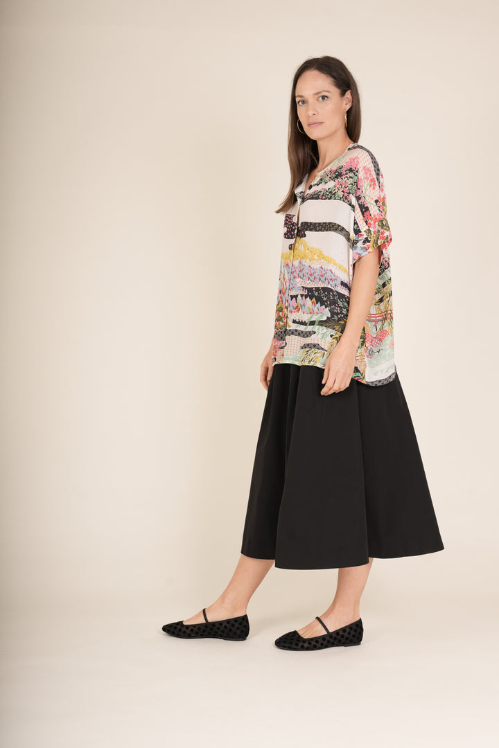 Blusa de té blanca de primavera