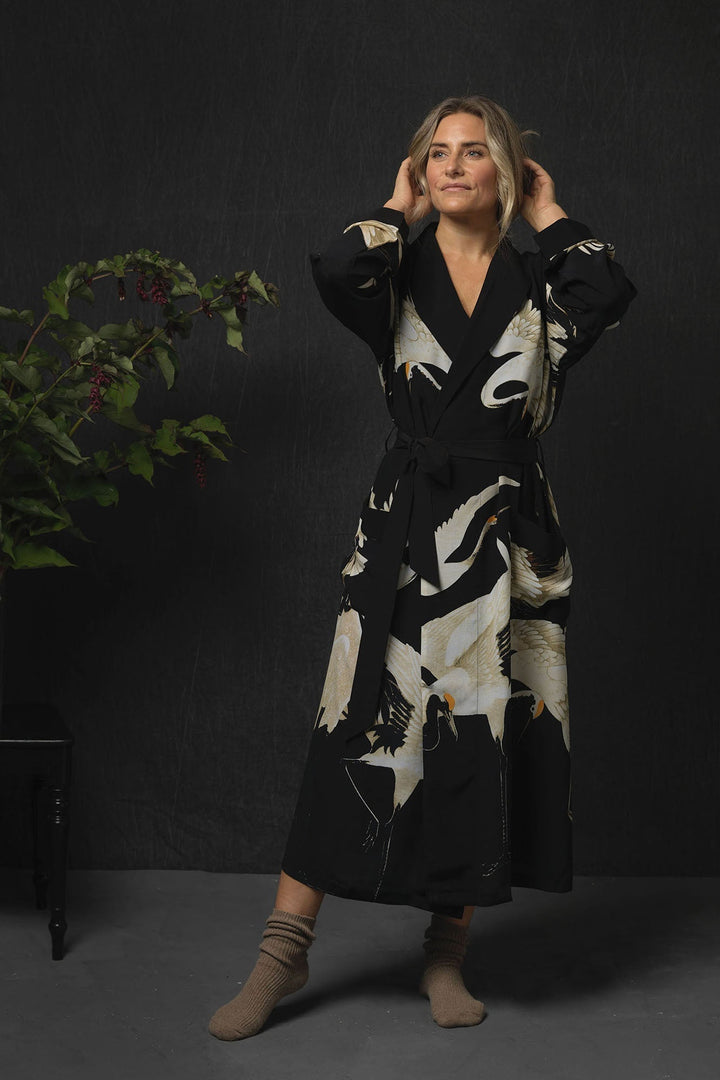 One Hundred Stars Luxe Stork Black Crepe Gown- This gown is perfect as a luxurious house coat or for layering as a chic accessory to your favourite outfit. We have used our crepe fabric for this line which gives a wonderful 1920s feel to the garment, while providing a little extra weight and less transparency.